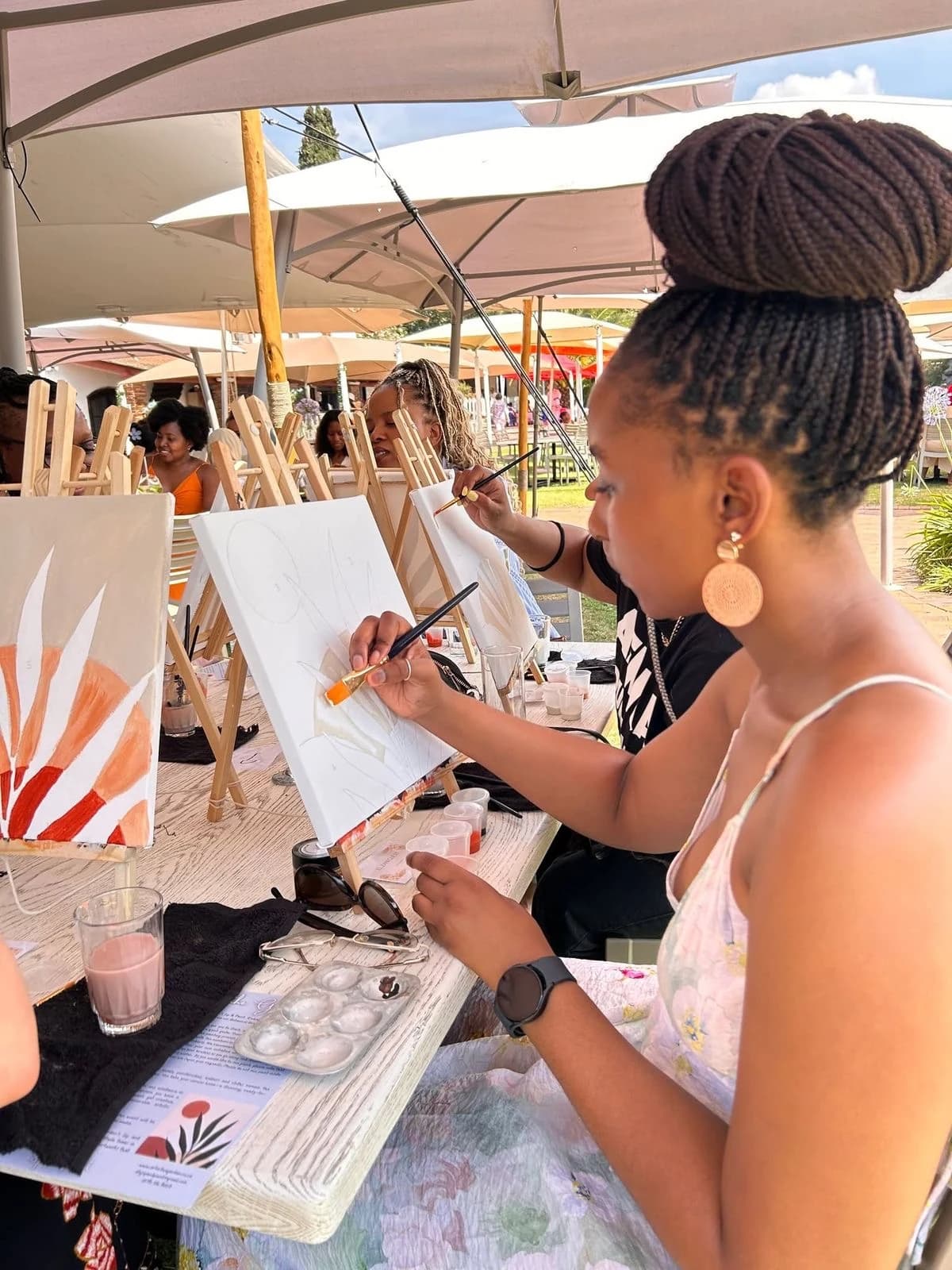 Guests painting during The Gath Ring Reflect creative experience
